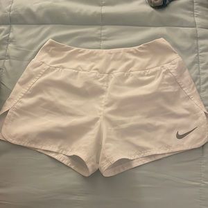 Women’s white Nike dri-fit shorts. Size S.